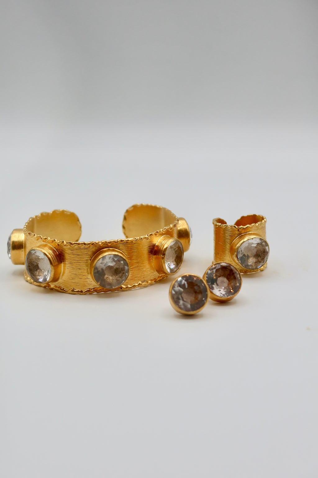 The Aurora Gem Set in Gold with Silver Crystal