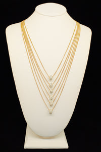 V LAYERING WITH CYLINDER CHARM